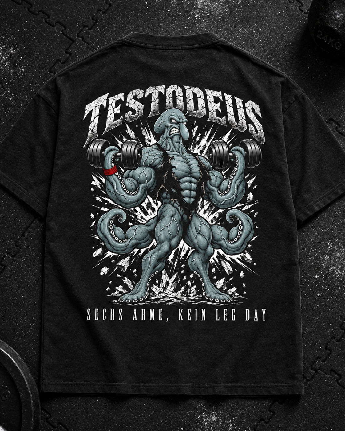 TESTODEUS Oversized Shirt schwarz - Flat-Lay Produktfoto auf Gym-Gummimatte
