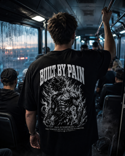 Built By Pain Oversized Shirt - schwarzes Oversized-Shirt getragen auf dem Rave
