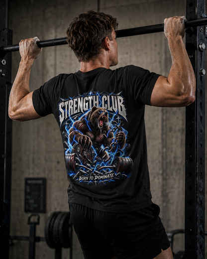 Stärkeclub Grizzly Shirt Unisex - schwarzes Unisex-Shirt getragen im Gym